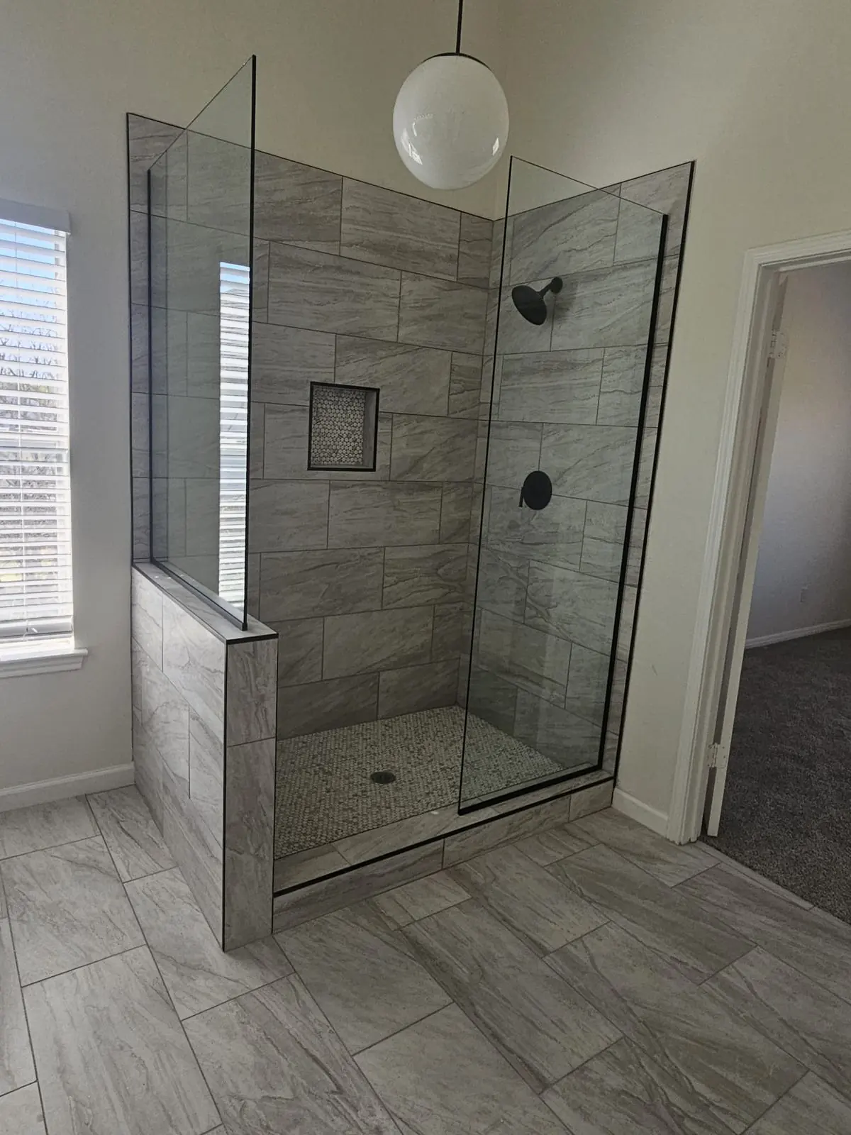 Corner glass shower installed by Jose